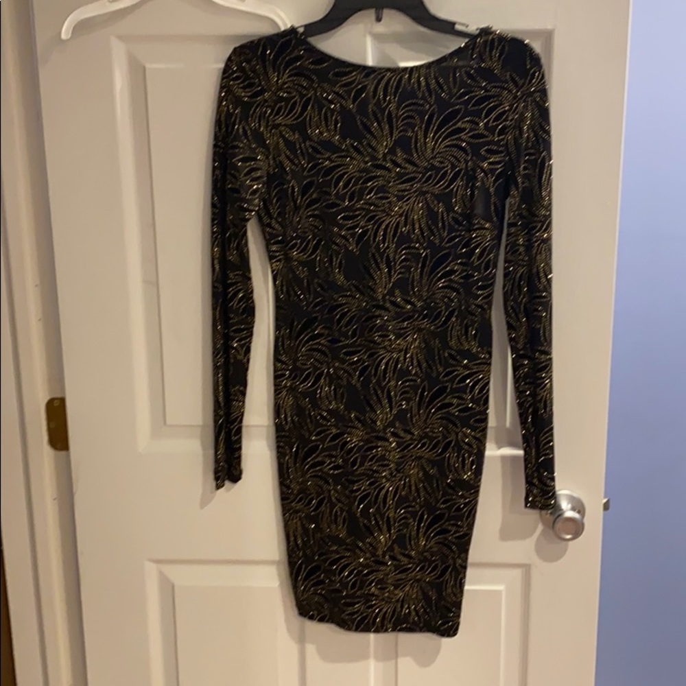 Women’s dress. Black with gold rhinestone